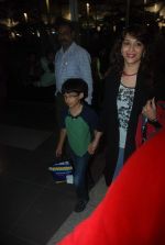 Madhuri Dixit snapped with kids and husband at the airport in Mumbai on 1st Jan 2012 (5).JPG